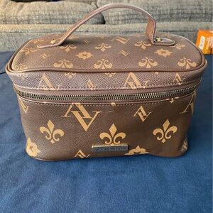 Adrienne Vittadini Brown and Tan Toiletry Bag